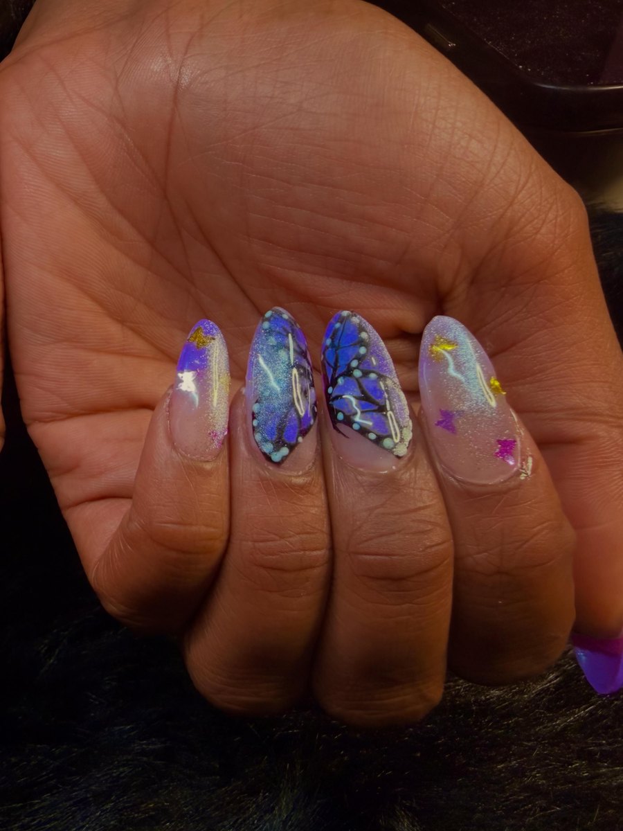 Blue and purple glitter nail art